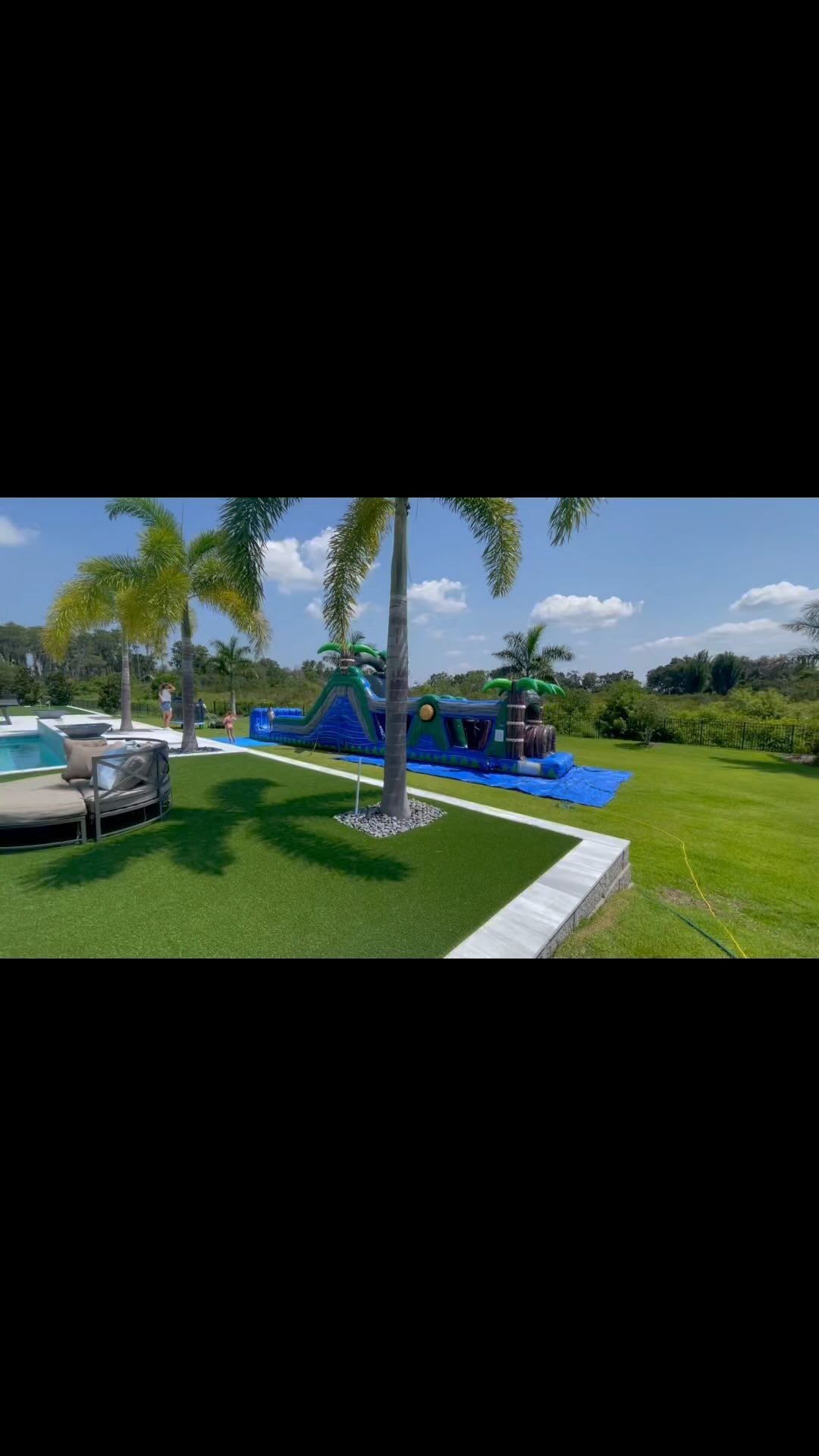 47ft inflatable obstacle course rental in a Central Florida backyard